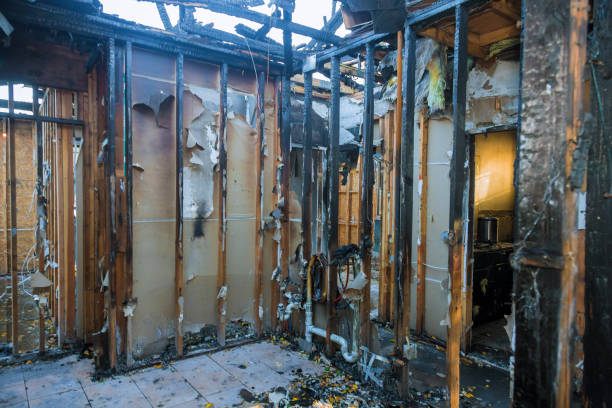 Professional Emergency Fire Damage Restoration technician working in Young America, MN